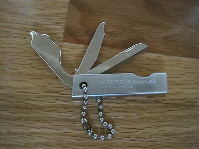 The Pueblo Savings & Trust Company Pocket Knife Keychain w/ File and Can Opener