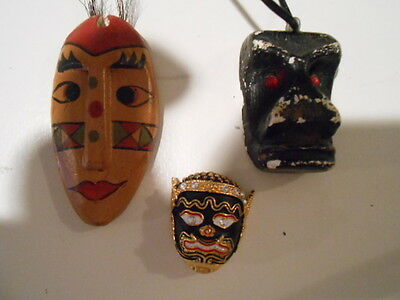 3  OLDTIME? MASKS MNIATURES. 60S BLACK,WOODEN, METAL PIN(COOL COLLECTABLES)