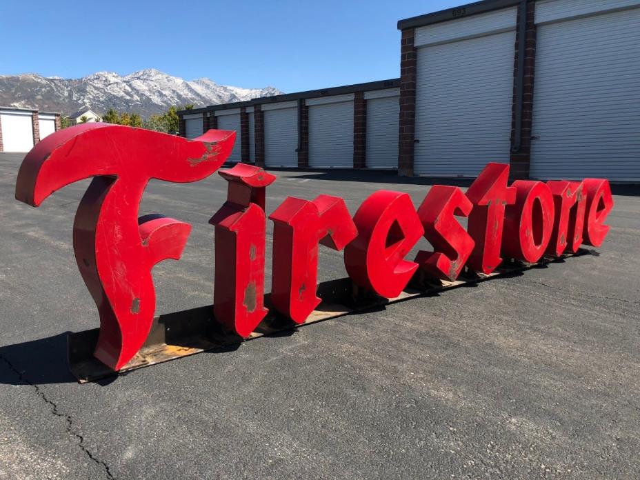 Heavy Duty Vintage Firestone Sign attached to Steal Beam