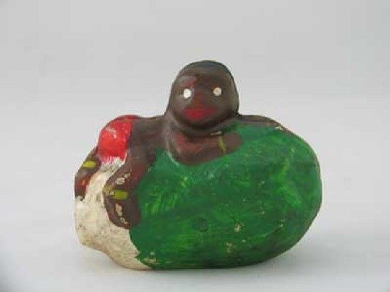 Black Americana Boy on a Cucumber Cast Iron Bank