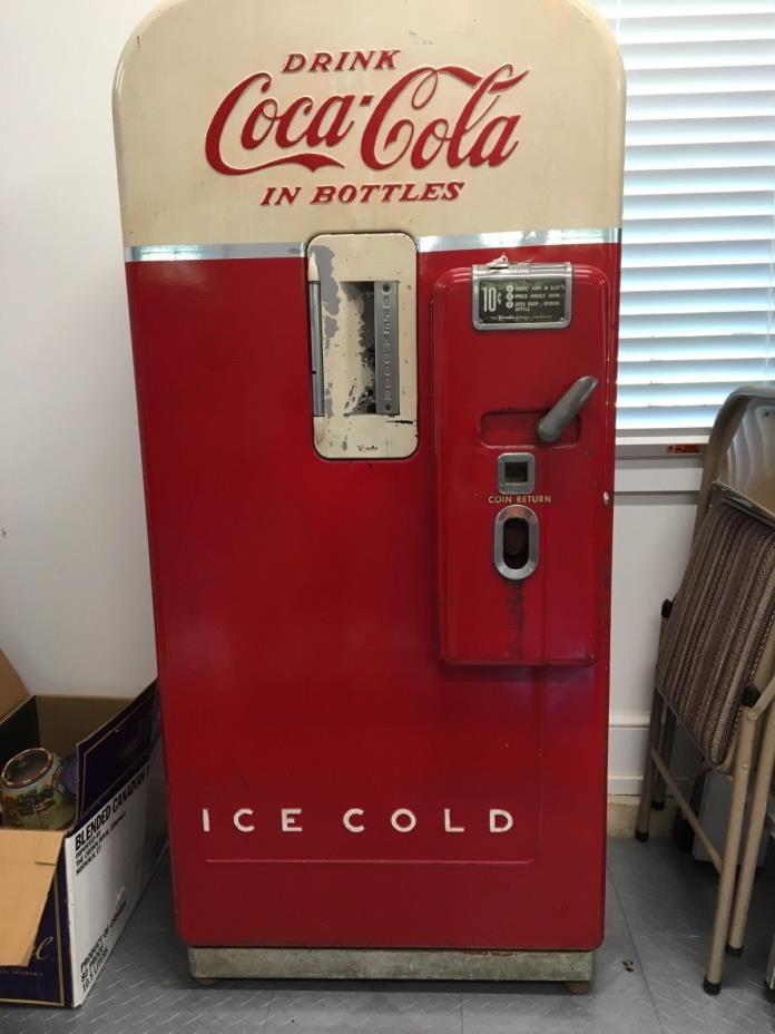 vintage coke bottle machine 1938