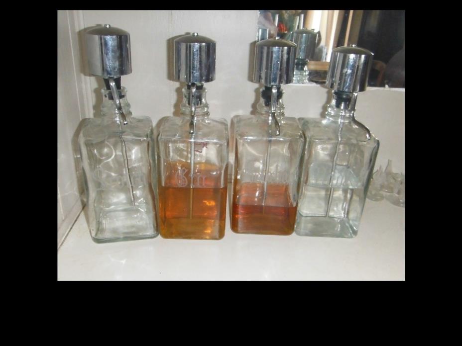 Set of 4 Mid Century Vintage Liquor Decanters with Pumps