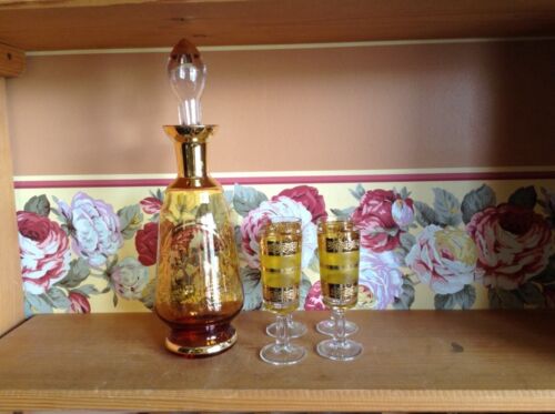 Vintage amber yellow and gold glass decanter and 4 cordial shot glasses