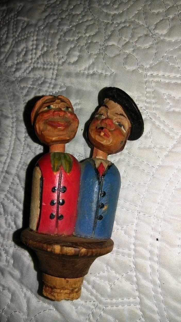 Vintage hand carved and painted man and woman kissing cork wine stopper