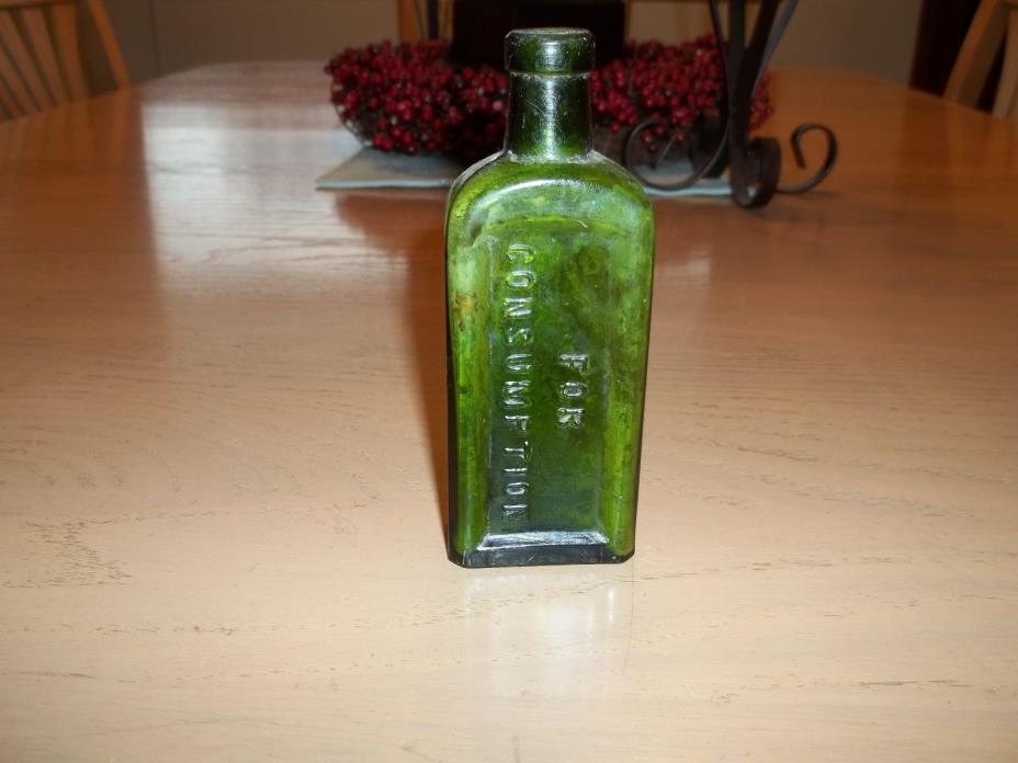 Antique green Piso's Cure Hazeltine & Co. bottle