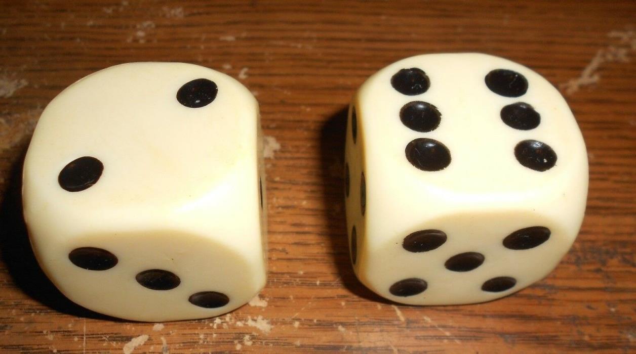 11/2 inch diameter white dice in good shape used