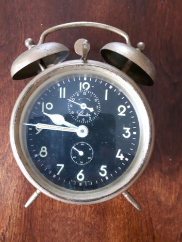 antique Schuler alarm clock