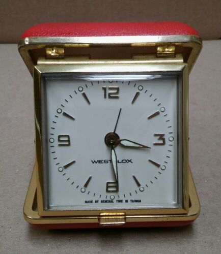 Vintage 1973 Westclox red plastic/brass folding alarm clock Taiwan -Serviced