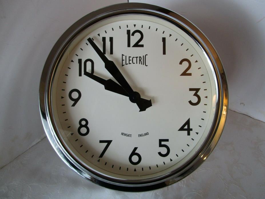Vintage 50’s Style wall Chrome Electric Clock by Newgate England 14 ½” W retro