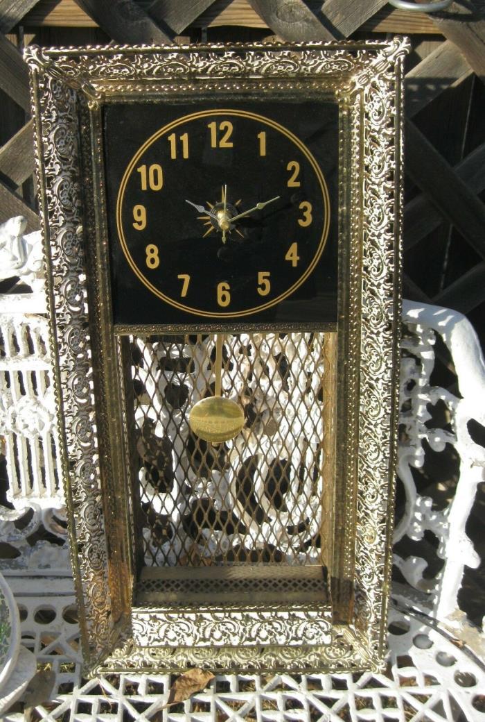 Mid-Century Modern Metal Wall Clock with Shelf & Black Glass Face