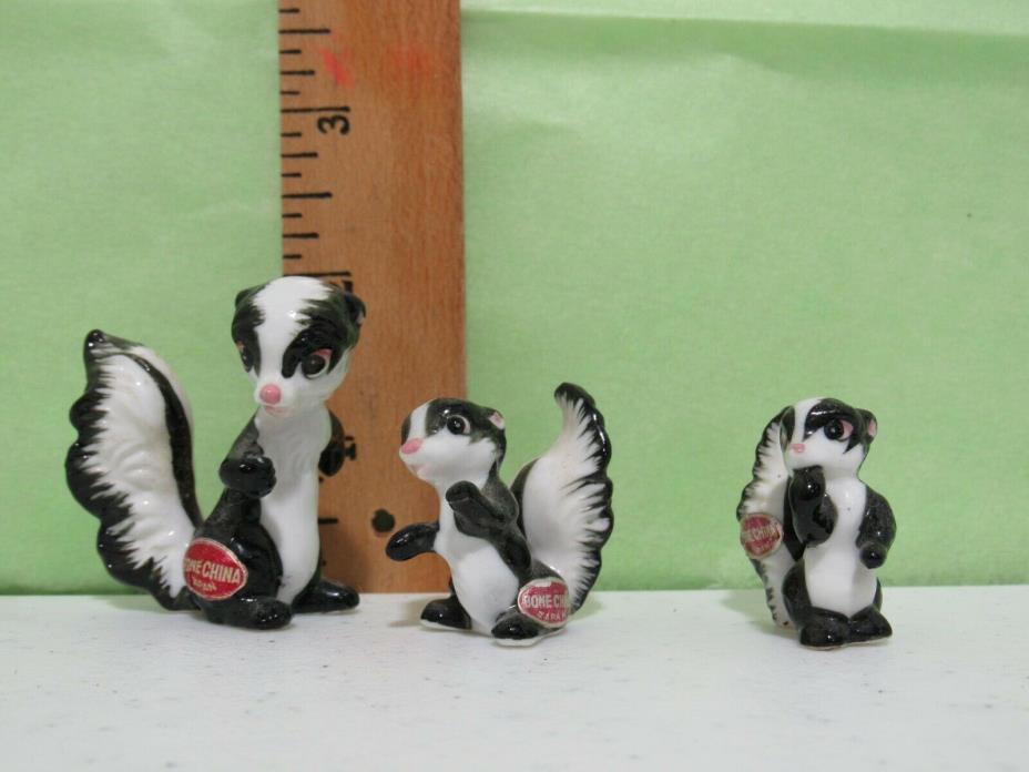 BONE CHINA SKUNK FAMILY MINIATURE FIGURINES (MADE IN JAPAN) 1950'S SET OF 3