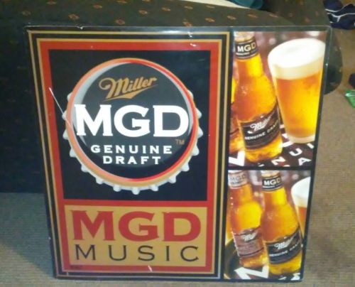 MILLER GENUINE DRAFT BEER EMBOSSED METAL TIN BEER SIGN  35 1/2 X 35 1/2 PREOWNED