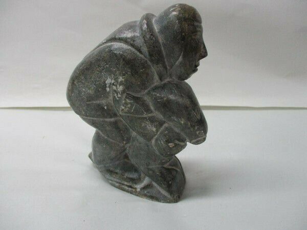 Vintage Inuit Soapstone Carving Depicting Hunter with Seals