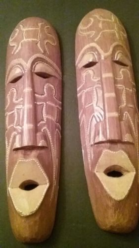 2 HANDCRAFTED CARVED TIKI WOOD MASKS TAN