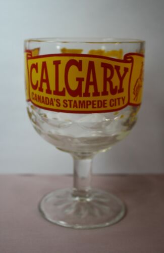 CALGARY CANADA'S STAMPEDE CITY ADVERTISING  GLASS DRINKING GOBLET  FOOTED 10 OZ.