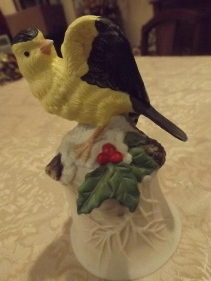 Decorative Bisque Porcelin Oriole with holly Bell