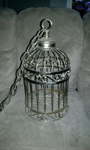 Vintage metal birdcage with hanging chain