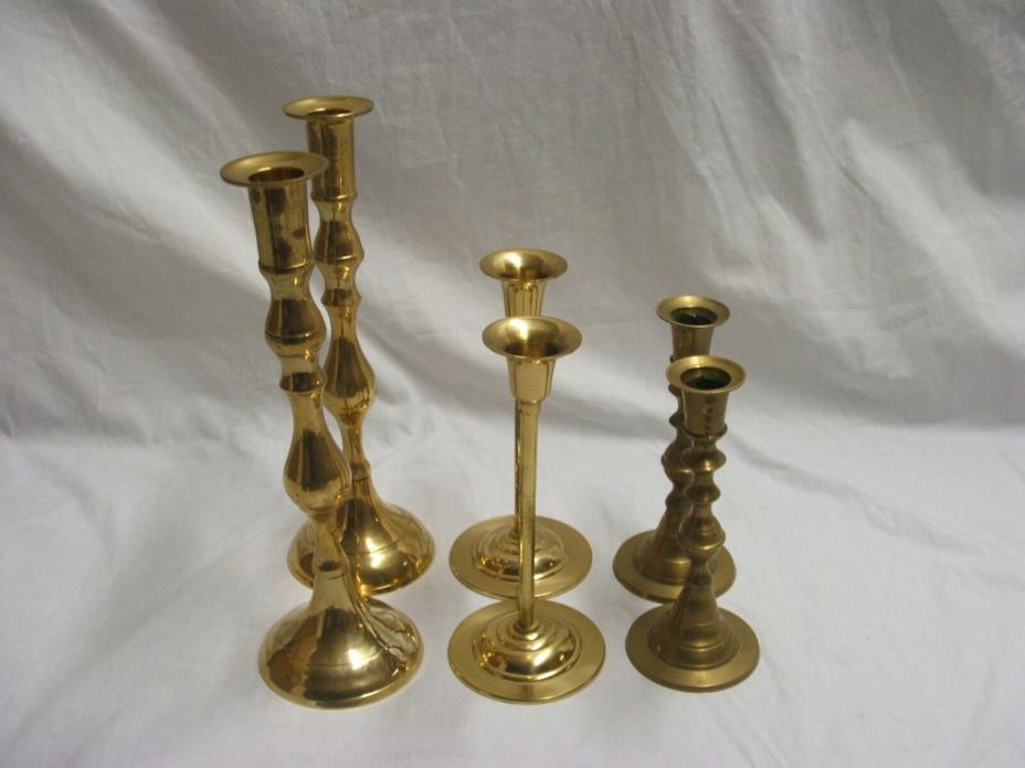 LOT OF BRASS CANDLE STICKS 3 PAIRS 6 TOTAL 11.5