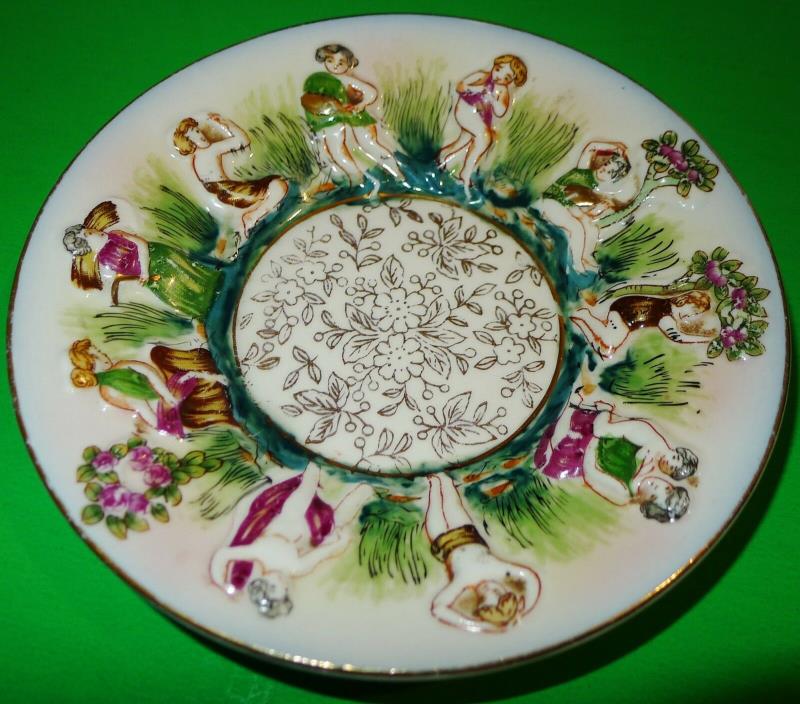 S.K.G  decorative porcelain plate made in occupied Japan - with women - 4¾