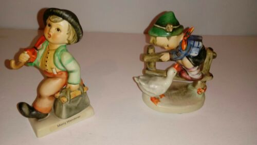 2 Hummel Figurines Merry Wanderer and Child with Duck