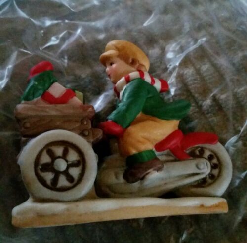 Colonial Village Figure Miniature by Lefton Boy Riding Bike With Packages