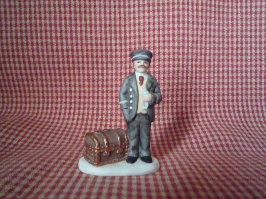 LEFTON COLONIAL CHRISTMAS VILLAGE -  RAILROAD MAN (STATION MASTER) WITH TRUNK