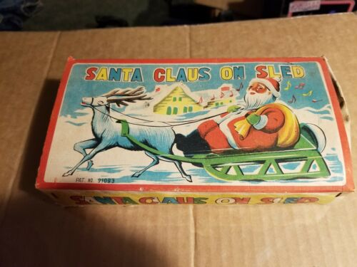 Santa Claus ON Sled MADE IN OCCUPIED JAPAN with KEY With Box....Nice...