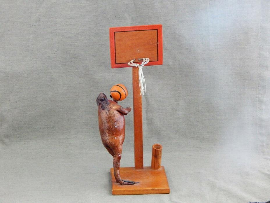 GENUINE ACTION FROG WITH BALL AND BASKETBALL HOOP.