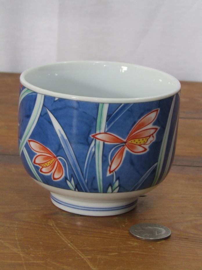 Vintage Asian tea cup with floral design