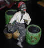 OLD VINTAGE ? COLD PAINTED LEAD ? BLACK BOY SMOKING PIPE SITTING ON CORN BASKET