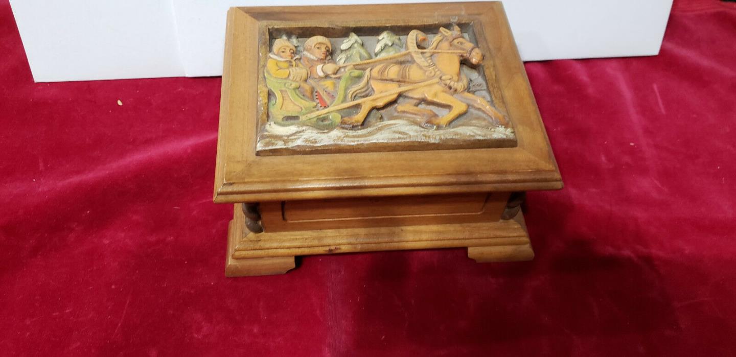 Anri Hand Carved Music Box Couple in Horse Drawn Sled on Top 7 X 6