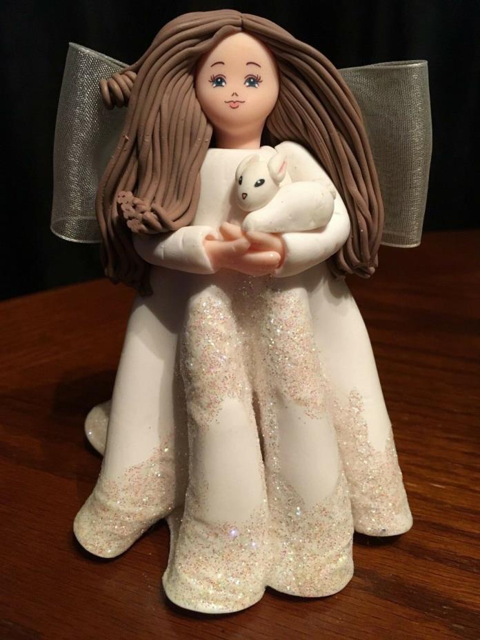 Girl in Sparkling Dress with bow holding Bunny 5