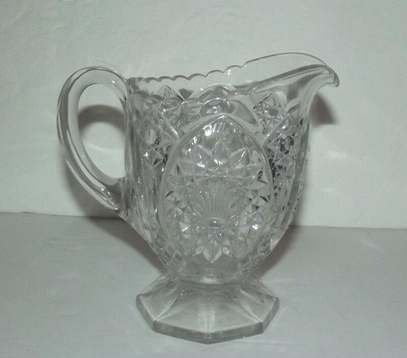 NEAT UNMARKED DECORATICE GLASS PITCHER WITH SEASHELL DESIGN