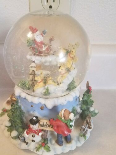 Santa Claus Christmas Musical Snow Globe - plays 