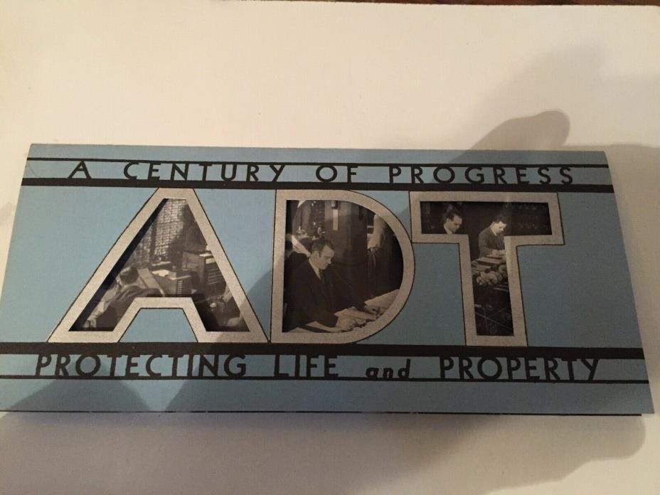 BOOK    A CENTURY OF PROGRESS   PROTECTING   PLUS HAT