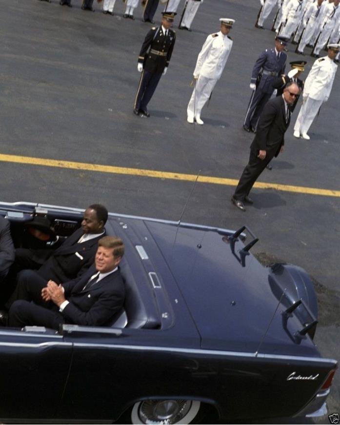 President John F. Kennedy in back of limousine at airport New 8x10 Photo