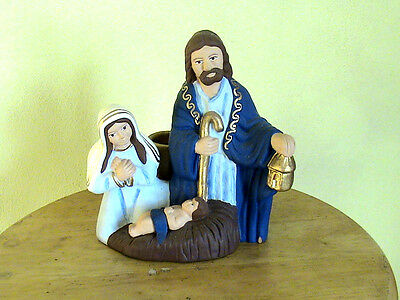 JOSEPH AND MARY WATCHING OVER BABY JESUS TAPER CANDLE HOLDER
