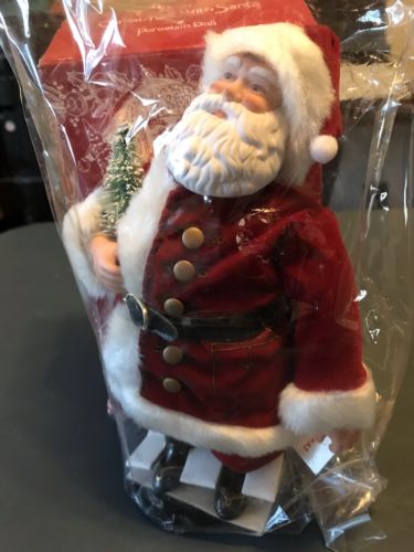 Avon Christmas With Santa Porcelain Doll 1989 w/box and Stand