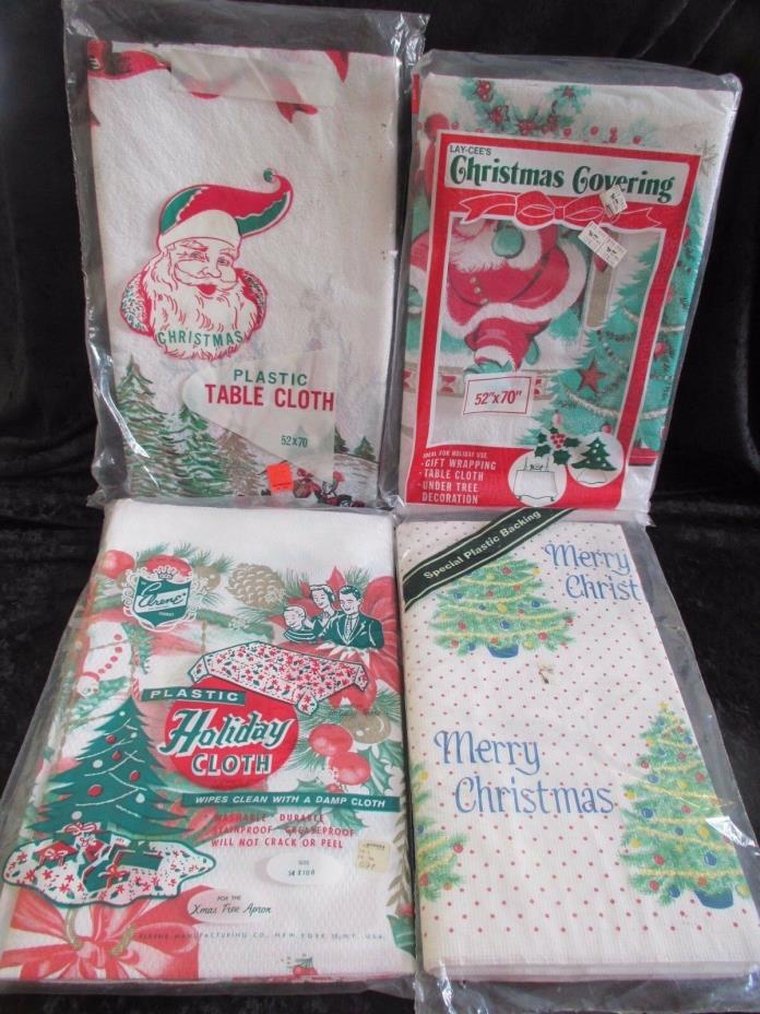 4 VINTAGE DISPOSABLE PLASTIC PAPER CHRISTMAS TABLECLOTHS   MADE IN USA