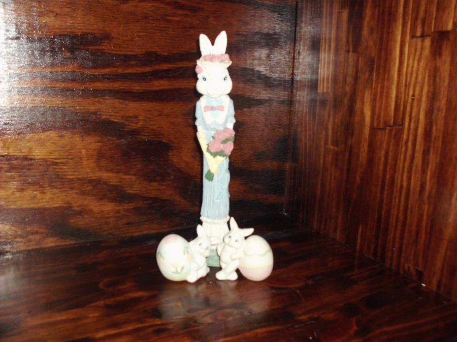 large pencil easter rabbit and bunnys holding egg