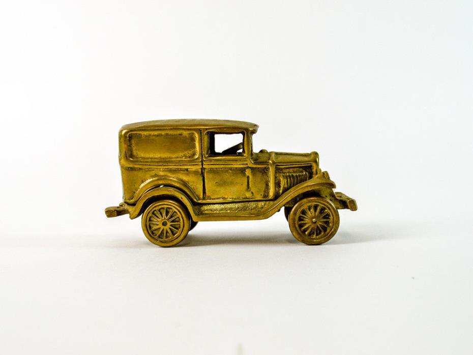 Vintage Brass Car Lover Figurine Wheels Move Statue Antique Art Paperweight