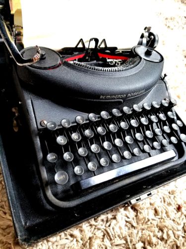 vintage Remington Rand Noiseless model seven black portable typewriter in case