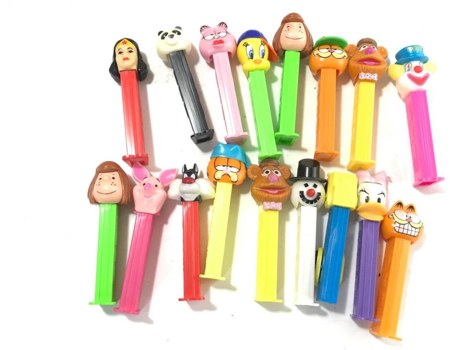 Lot Of 17 PEZ Dispensers Garfield, Fozzy. Kung fu Panda. Wonder Woman Tweety Etc