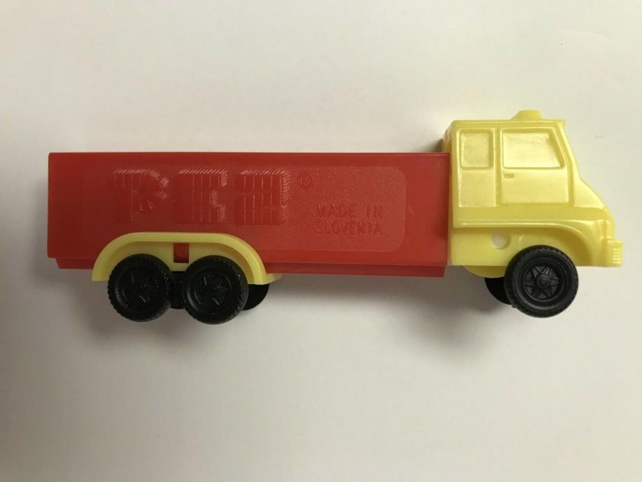 Vintage Truck Pez Dispenser No Feet Slovenia-Red Truck w/ Yellow Cab