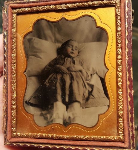 Post mortem ambrotype of young child laying in bed - super condition- half case