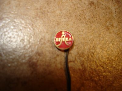 Vintage red Tesla metal pin badge stick pin.
