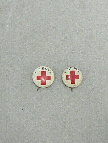 PAIR OF I SERVE RED CROSS PIN BACK BUTTONS