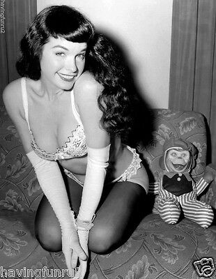 Bettie  Pages Posed on Couch with Stuffed Monkey 5 x 7  Photograph