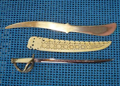 THREE VINTAGE LETTER OPENERS-BRASS, CARVED CELLULOID, HISTORIAL CLUB LIFE MEMBER