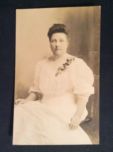 REAL PHOTO POST CARD, WOMAN SITTING - NO POSTMARK - AZO STAMP BOX